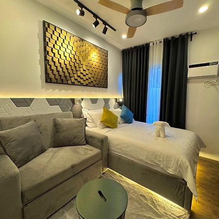Fullerton Suites Puting Kahoy 外观 照片